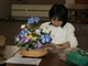 Past Activities: Student with flowers 4